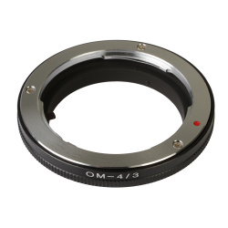 На фото изображено Кольцо переходное Olympus OM на OM4/3