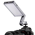 На фото изображено Осветитель светодиодный Godox RGB Mini Creative M1 накамерный