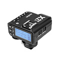 На фото изображено Пульт-радиосинхронизатор Godox X2T-F TTL для Fujifilm