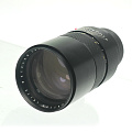 На фото изображено Объектив Leica Elmarit R 2.8/180 №2673741 с заглушкой