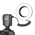 На фото изображено Вспышка для макросъемки Godox ML-150II кольцевая