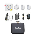 На фото изображено Осветитель светодиодный Godox ML100R Kit2 (с AK-B01)